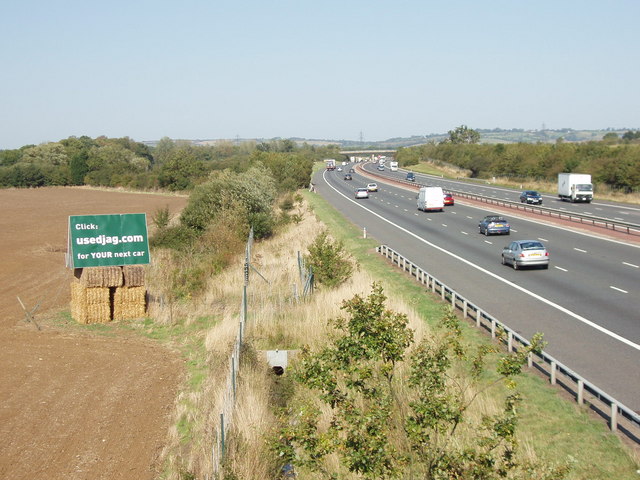 File:Billboard advertising by M40 motorway, near Waterperry Common - Geograph - 245133.jpg