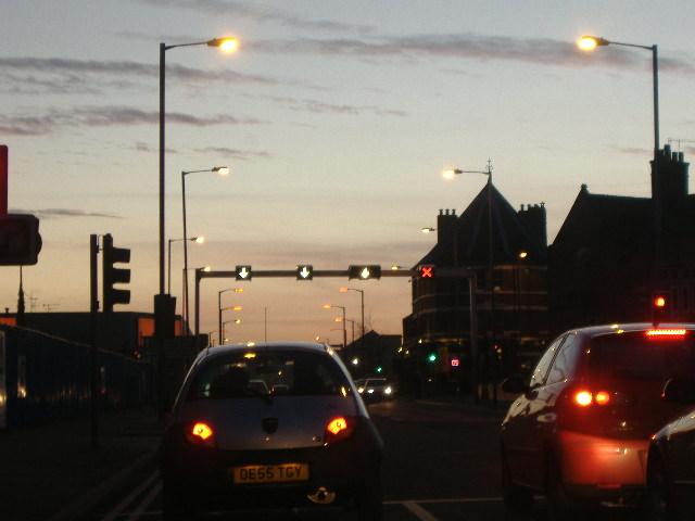 File:The Queens Road Tidal Flow system on the A61 in Sheffield. OK, it's a slightly dark photograph, but the lighting effects on it just seemed great in my humble opinion. The sunset was great that day. - Coppermine - 4607.jpg