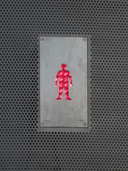 File:Poole- red man on the Twin Sails Bridge.jpg