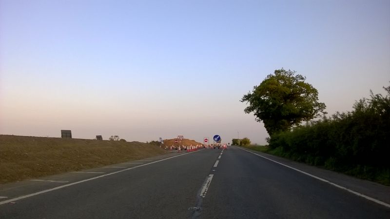 File:20160605-2041 - Old A1 northbound carraigeway - local access road looking south - 54.4145755N 1.6629284W.jpg