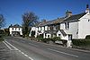 Terrace of houses along the main road at Bray Shop - Geograph - 409643.jpg