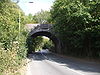 Bridge of dismantled railway over the A4119 - Geograph - 1516412.jpg