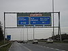 M1 northbound approaching Airport Exit Gantry - Coppermine - 4775.JPG