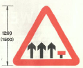 Reduction of available traffic lanes ahead (may show different layout to suit conditions) - phased out in 1981