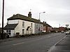 View south past cottages on the B1150 (Norwich Road) - Geograph - 1065167.jpg