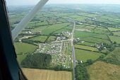 Aerial view of crossroads of A487 and B4333 near Tan-Y-Groes.jpg