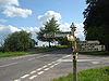Crossroads with old roadsign, near Holman Clavel - Geograph - 449071.jpg