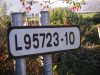 20161023-1635 - Long Irish L Road name plate at junction with R572 (51.681538N 9.7005469W).jpg