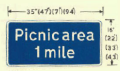 Distance to picnic area ahead (may be varied to Toilets, Car park, Parking, or Garage parking - phased out in 1975