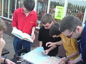 NDP, Simon H, Chris M, and Steven with a map. - Coppermine - 1885.jpg