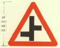 Staggered junction, first road on left (may be reversed) - phased out in 1975