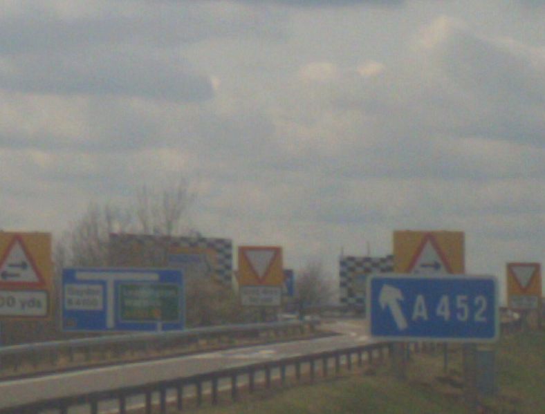 File:A rather impressive collection of signs at M40 J13 - Coppermine - 17533.jpg