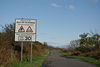 Road sign on arrival on the Isle of Cumbrae - Geograph - 1038901.jpg