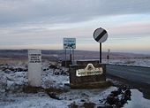 A collection of signs on the A672 - Geograph - 97127.jpg