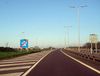 Road sign marking the end of motorway regulations - Geograph - 1307270.jpg