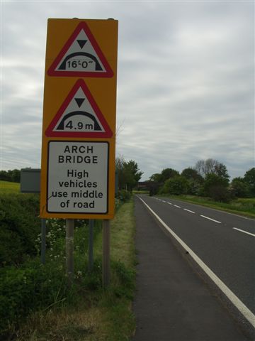 File:A423 Marton Arch Bridge Warning Signs and High Vehicles Use Middle of Road Plate - Coppermine - 11635.jpg