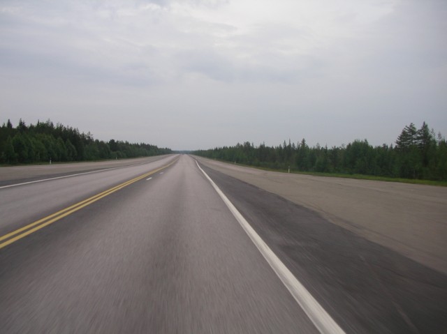 File:E75 Finland, occasionally the road got very wide and straight with massive concrete verges - Coppermine - 6725.jpeg