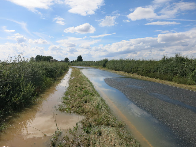 File:Floodwaters crossing Ramper Road - Geograph - 4134506.jpg