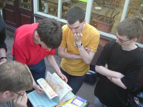 File:Nic, NDP, Chris M, and Simon H all nosey over maps. - Coppermine - 1884.jpg