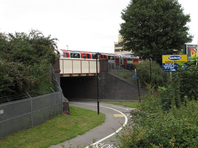 File:Central Line train over cycle track by... (C) David Hawgood - Geograph - 2573433.jpg