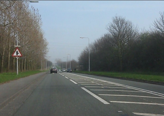 File:Dead straight on the A5117 (C) Peter Whatley - Geograph - 2875287.jpg