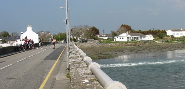 File:Water flowing through the gate in the Four Mile Bridge - Geograph - 817510.jpg