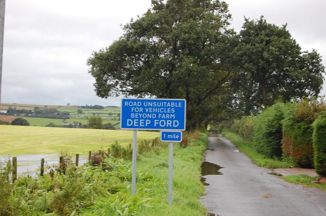 File:Warning at Ling Cottages - Geograph - 956517.jpg