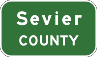 File:I-70-utah-county-line-sign.png