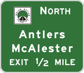 File:Okla-indian-nation-turnpike-antlers-mcalester-advance-guide-sign-reduced.png