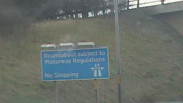 File:Roundabout subject to motorway regulations sign - Coppermine - 20765.JPG