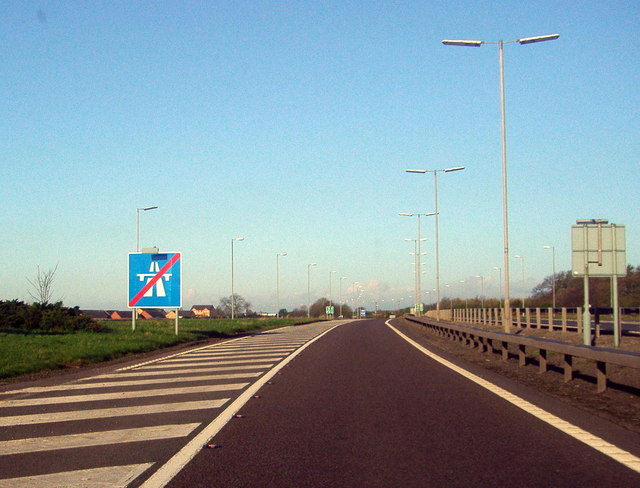 File:Road sign marking the end of motorway regulations - Geograph - 1307270.jpg