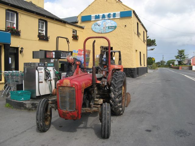 File:Tractor at Keogh's Store - Geograph - 4654866.jpg