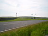 The A68 at Carter Bar with border flags, marker stone and beacon - Geograph - 1383678.jpg