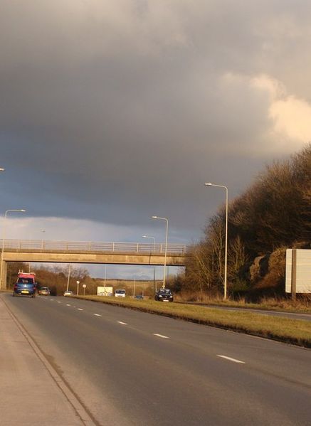 File:Bridge over the A4229, and stormy weather - Geograph - 1716103.jpg