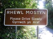 Rhewl Mostyn Please Drive Slowly.jpeg
