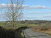 A3124 drops into the valley of a tributary of the River Yeo - Geograph - 1703763.jpg