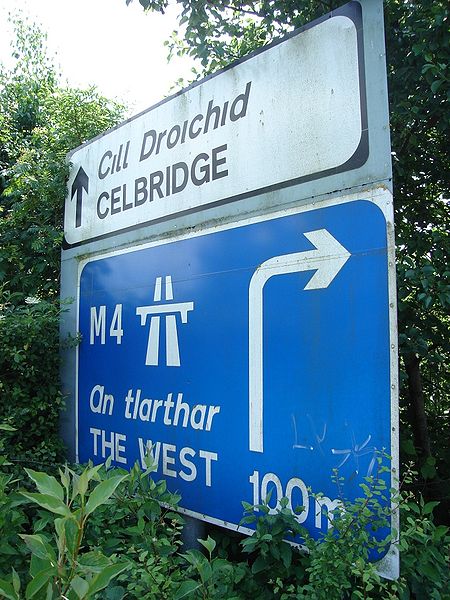 File:Celbridge Road Junction. I have a fear these will disappear in due course. One unfortunate problem is that most of the signs are obscured by overgrown plants!! Wonder when last they were cut. - Coppermine - 22433.JPG