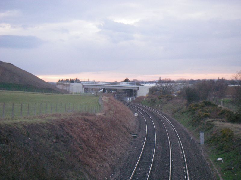 File:20180403-1931 - View of ELOR railway Crossing from Crawshaw Woods Bridge.jpg