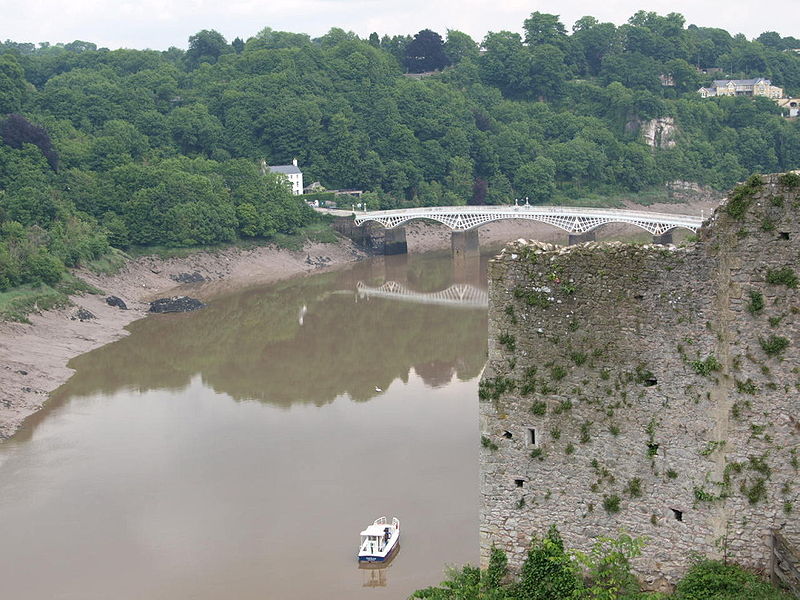 File:Old Chepstow bridge appears from behind Chepstow Castle.jpg