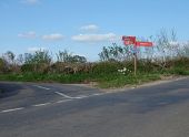 Red Signpost near Benville Bridge - Geograph - 405922.jpg