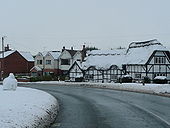 Thatched cottage in snow - Geograph - 1663748.jpg