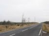 The A704 heading through Woodmuir... (C) Liz 'n' Jim - Geograph - 2801498.jpg