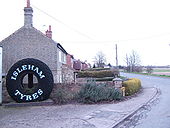 Effective advertisement and village sign - Geograph - 371878.jpg