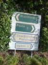 Corfe Mullen- old and even older sign at Jubilee Cross - Geograph - 1122756.jpg