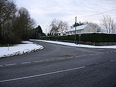 Snowy road junction - Geograph - 1158407.jpg