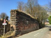 Halmer End- retaining wall of former railway bridge.jpg