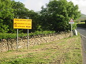 IOM Road Safety Sign On A18 - Coppermine - 13311.JPG