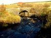 Old bridge over the Stenscholl River - Geograph - 1034774.jpg