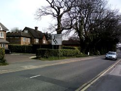 Double Mini Roundabout Sign -... (C) Simon Hollett - Geograph - 3919262.jpg