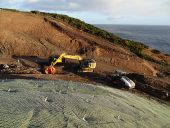 A9 Berriedale Braes Improvement - Slope netting and excavator.jpg